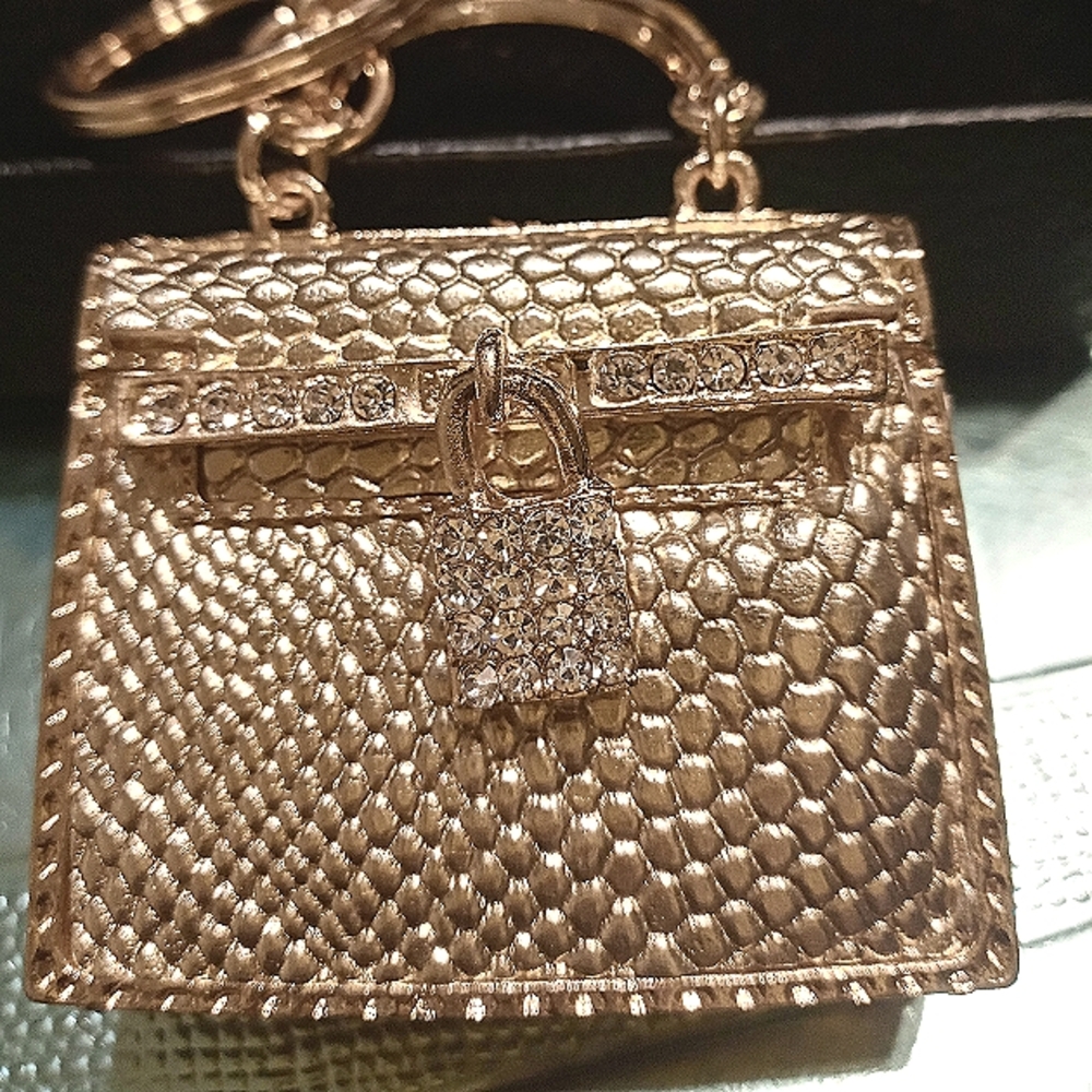 Gold and crystal Birkin bag key ring for designer purse.